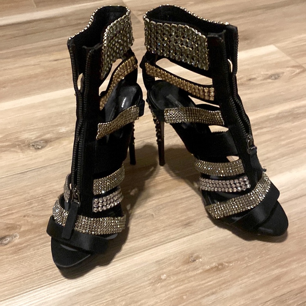 Black satin studded shoes the shoes are used